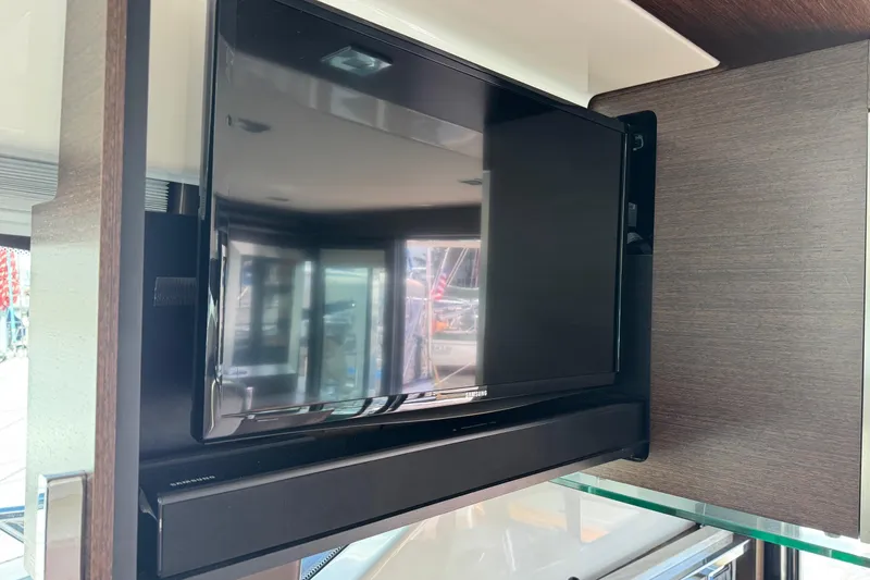 Slide: The Image of Night time view of the 2017 Tiara 44 Coupe featuring handrail courtesy lighting. Night Time View - 34