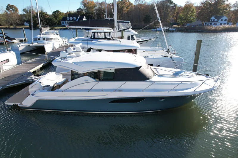 Slide: The Image of Luxurious interior of 2017 Tiara 44 Coupe yacht with spacious seating and scenic view. - 4