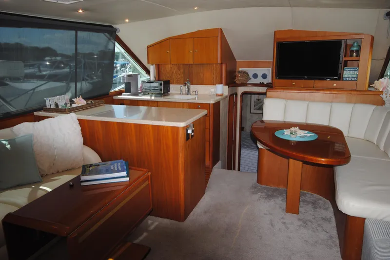 Slide: The Image of Luxurious interior of 1999 Ocean Yachts 45 Super Sport with modern amenities and elegant design. - 14