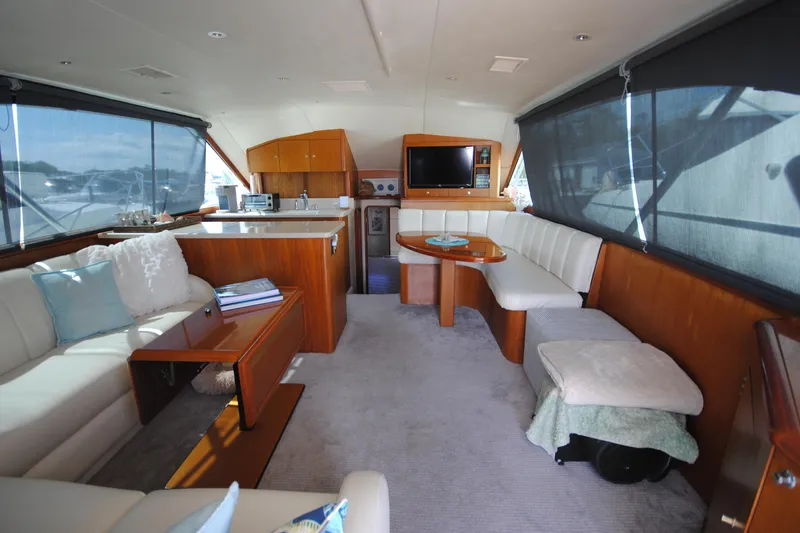 Slide: The Image of Luxurious interior of 1999 Ocean Yachts 45 Super Sport with plush seating and modern amenities. - 13