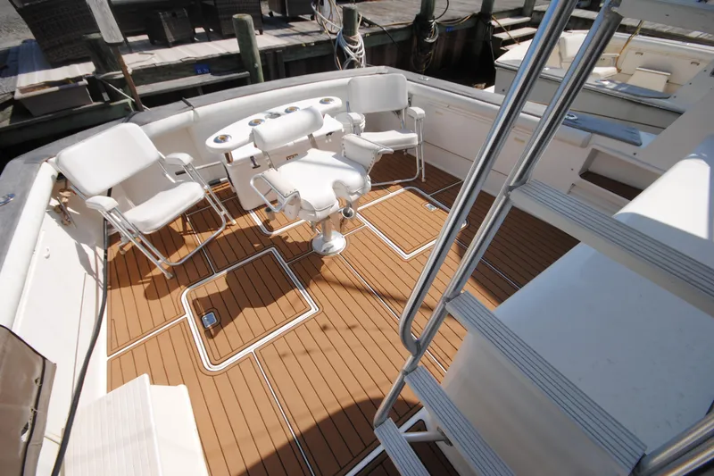 Slide: The Image of 1999 Ocean Yachts 45 Super Sport deck with chairs and fishing station. - 3