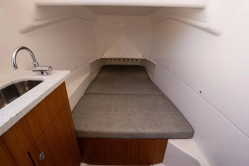 Slide: The Image of 2026 Solace 30 HCS boat interior with comfortable seating and modern design. - 26