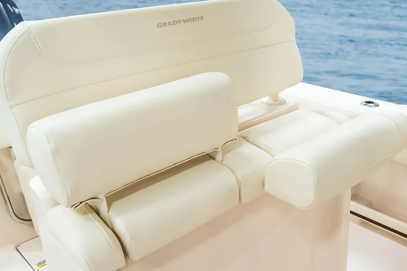 Slide: The Image of 2026 Grady-White Fisherman 236 boat with Yamaha outboard engine, docked in a marina. - 7