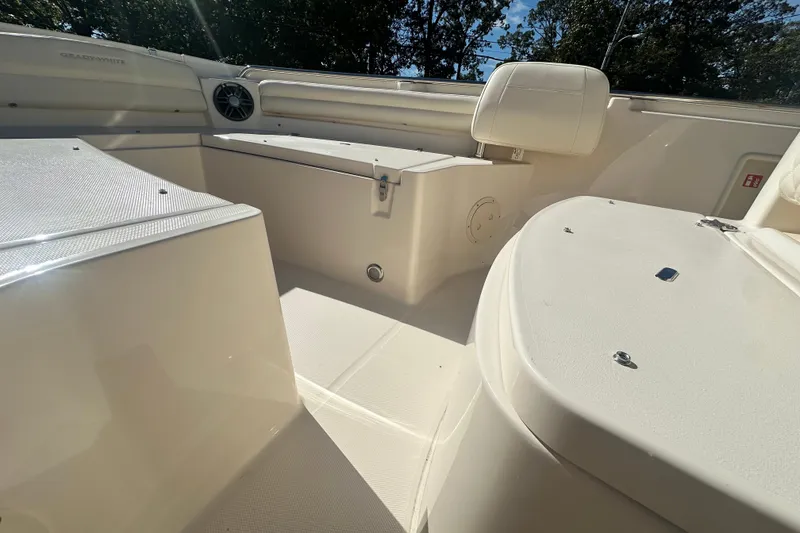 Slide: The Image of 2026 Grady-White Fisherman 216 boat interior with seating and storage compartments. - 15