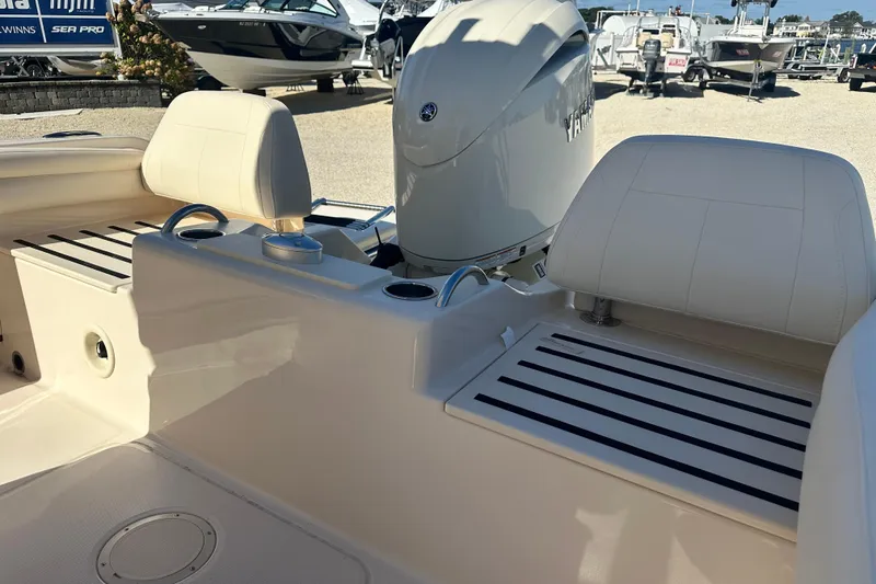 Slide: The Image of 2026 Grady-White Fisherman 216 boat interior with seating and Yamaha engine. - 5