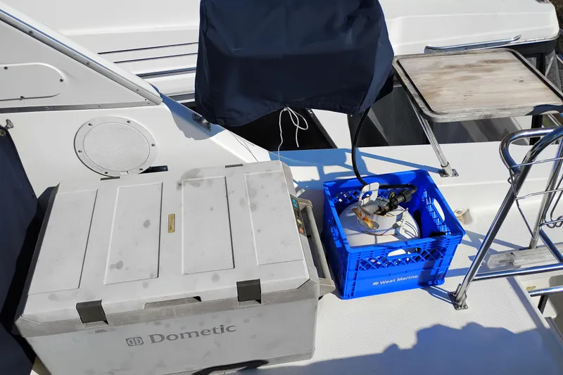 Slide: The Image of Bayliner 4788 Pilot House Motoryacht deck with storage box and marine equipment, 2000 model. - 31