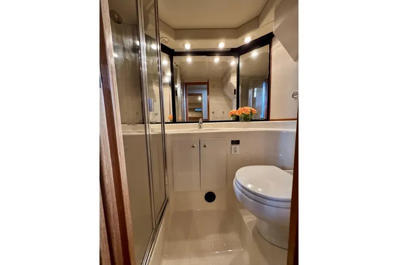 Slide: The Image of Luxurious bathroom in 2000 Bayliner 4788 Pilot House Motoryacht with modern fixtures and elegant design. - 49
