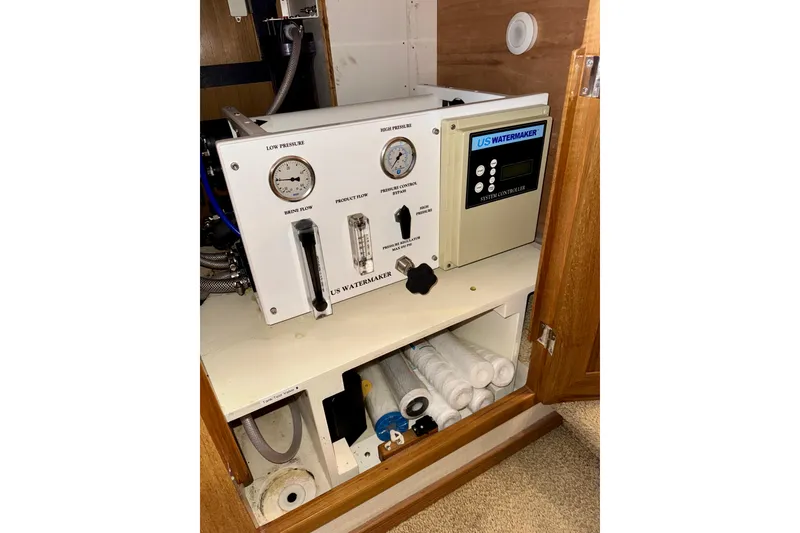 Slide: The Image of US Watermaker system in 2000 Bayliner 4788 Pilot House Motoryacht cabinet. - 51