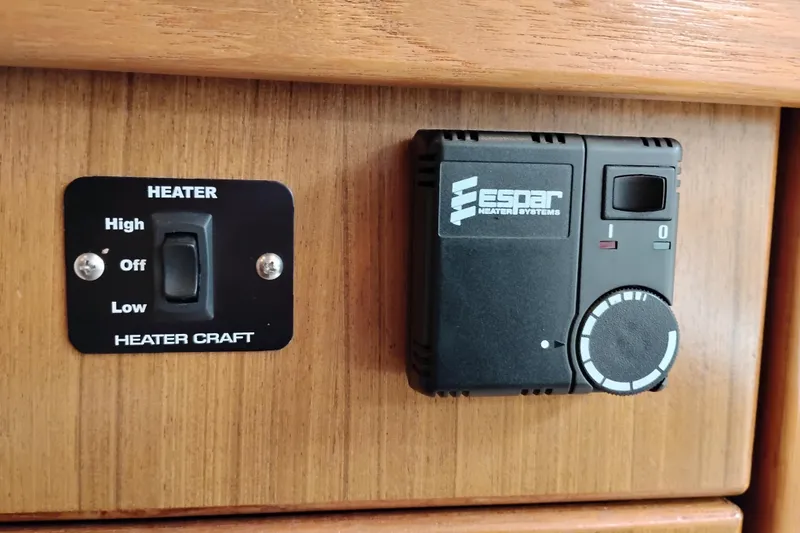 Slide: The Image of Heater controls on 2000 Bayliner 4788 Pilot House Motoryacht, featuring Espar and Heater Craft systems. - 56