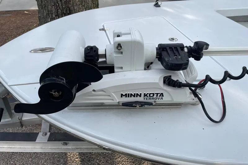 Slide: The Image of Minn Kota Terrova trolling motor on 2023 Riptide 17 Flats boat deck. - 24