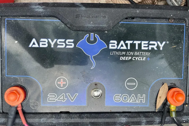 Slide: The Image of 2023 Riptide 17 Flats boat with Abyss 24V 60AH lithium-ion deep cycle battery. - 27