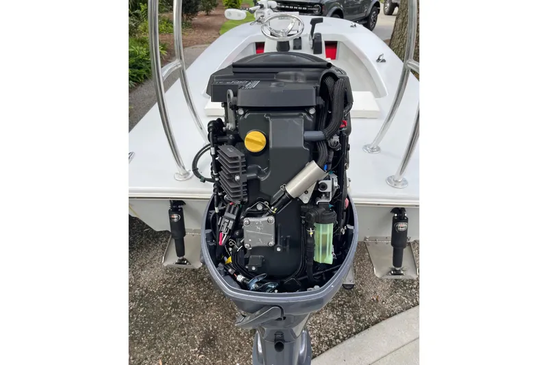 Slide: The Image of 2023 Riptide 17 Flats boat engine, detailed view of internal components. - 35