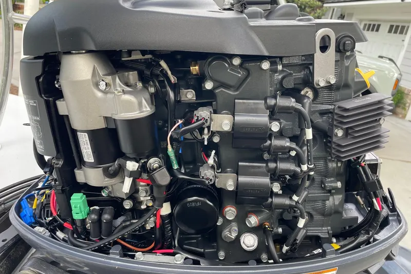 Slide: The Image of 2023 Riptide 17 Flats engine, detailed view of components and wiring. - 36