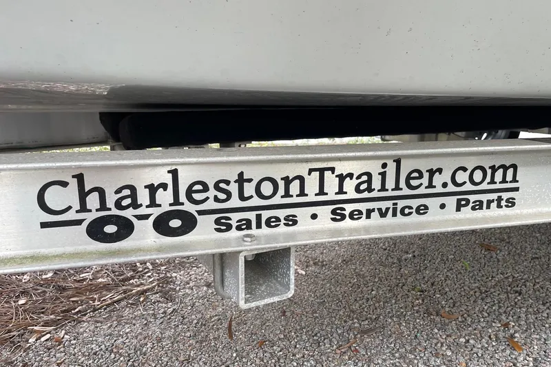 Slide: The Image of Trailer with CharlestonTrailer.com branding for sales, service, and parts. Riptide 17 Flats 2023. - 37