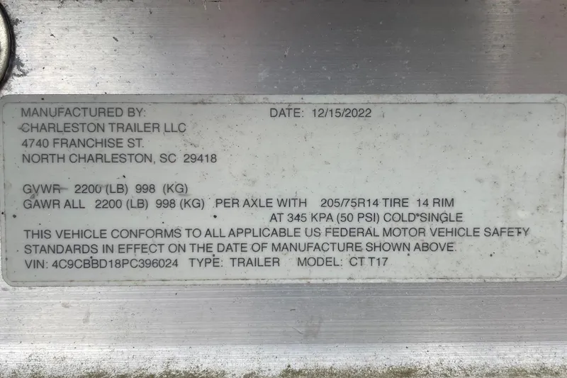 Slide: The Image of Charleston Trailer LLC label, 2023 Riptide 17 Flats, GVWR 2200 lbs, manufactured 12/15/2022. - 38