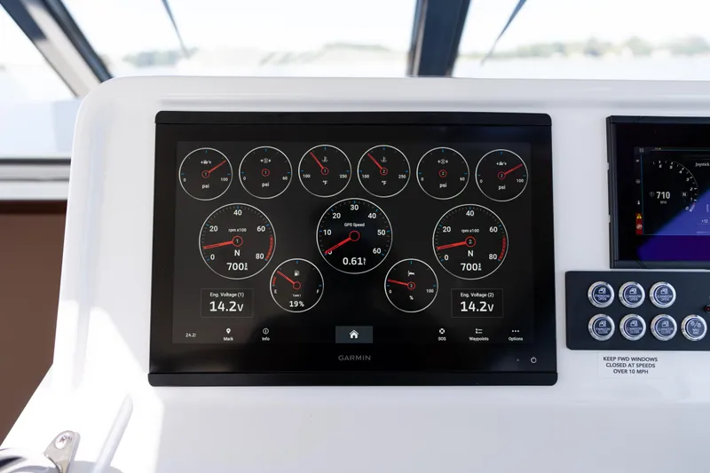 Slide: The Image of Helm of 2023 MJM Yachts 4, featuring modern navigation and control systems. - 11