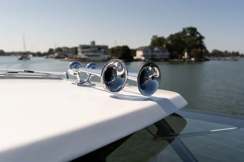 Slide: The Image of 2023 MJM Yachts 4 interior with sleek design and spacious deck on calm waters. - 17