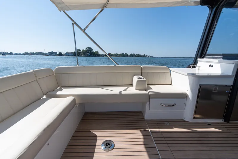 Slide: The Image of Garmin radar on 2023 MJM Yachts 4, with water and boats in background. - 19