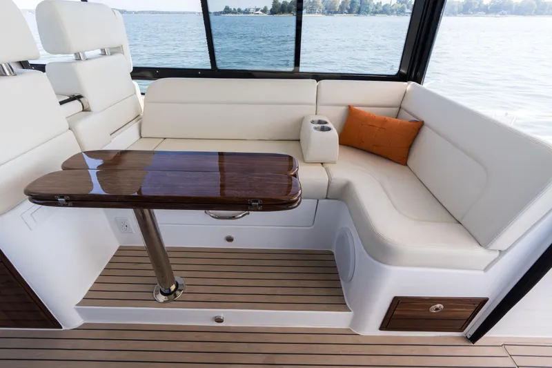 Slide: The Image of Luxurious 2023 MJM Yachts 4 interior with modern kitchen and seating area on deck. - 24