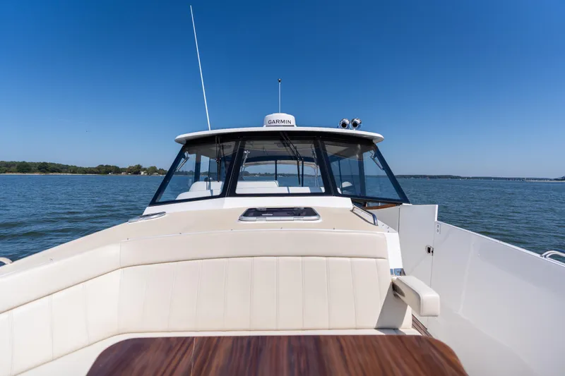 Slide: The Image of 2023 MJM Yachts 4 interior view, featuring sleek design and spacious seating on the water. - 46