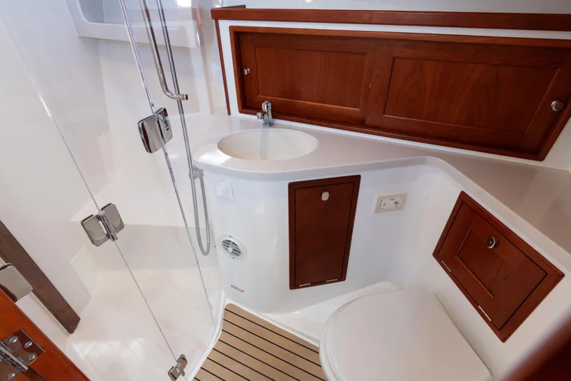 Slide: The Image of Luxurious bathroom in 2023 MJM Yachts 4, featuring wood accents and modern fixtures. - 60
