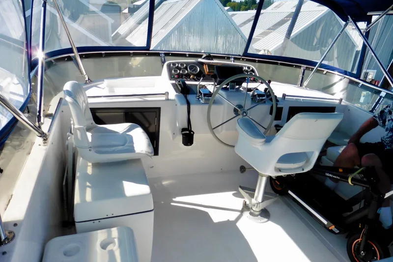 Slide: The Image of Side deck of 1997 Ocean Alexander 426 Classico yacht, docked at marina. - 14