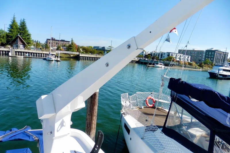 Slide: The Image of 1997 Ocean Alexander 426 Classico yacht helm with steering wheel and navigation controls. - 21