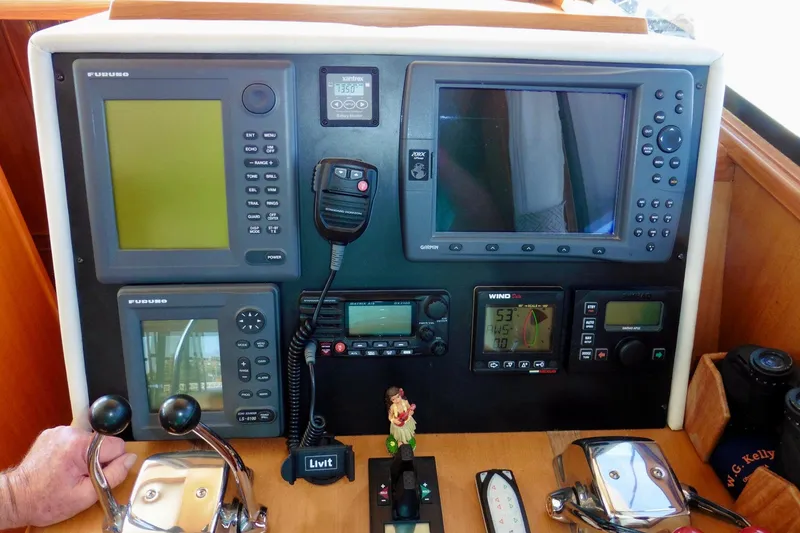 Slide: The Image of 1997 Ocean Alexander 426 Classico yacht interior with kitchen and helm station. - 43