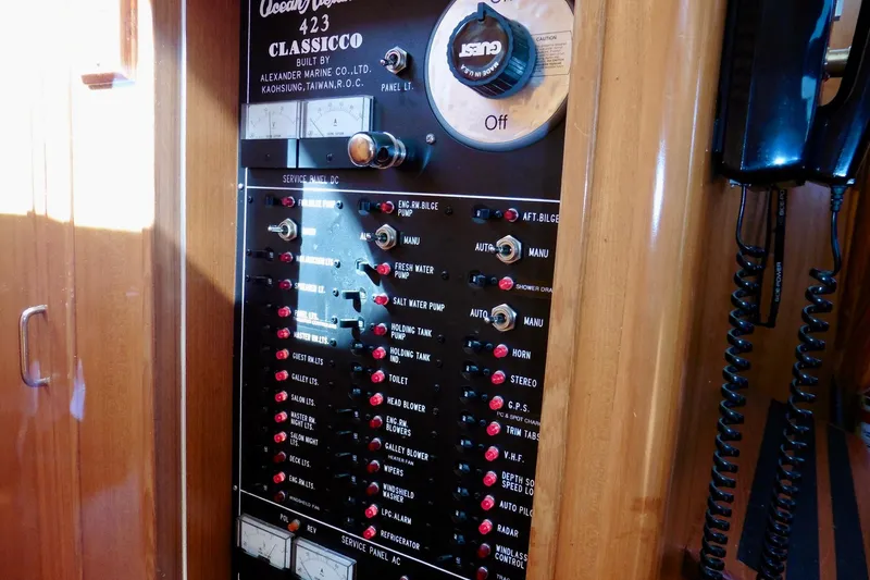 Slide: The Image of Interior of 2000 Ocean Alexander 423 Classico yacht kitchen with wood cabinetry and appliances. - 50