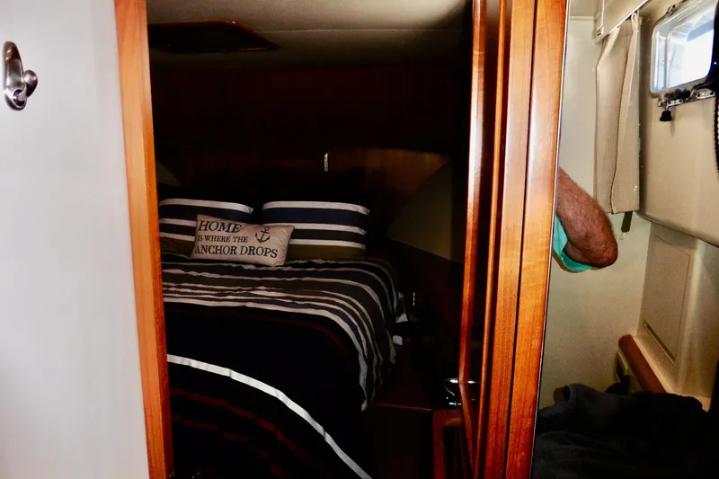 Slide: The Image of Bunk beds in 2000 Ocean Alexander 423 Classico yacht cabin with wooden interior. - 64