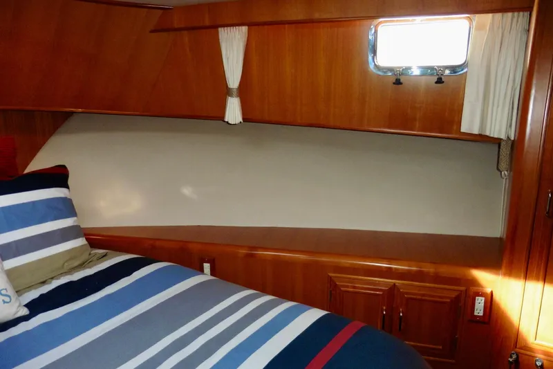 Slide: The Image of Wooden interior of 2000 Ocean Alexander 423 Classico with fire extinguisher and gauges. - 67