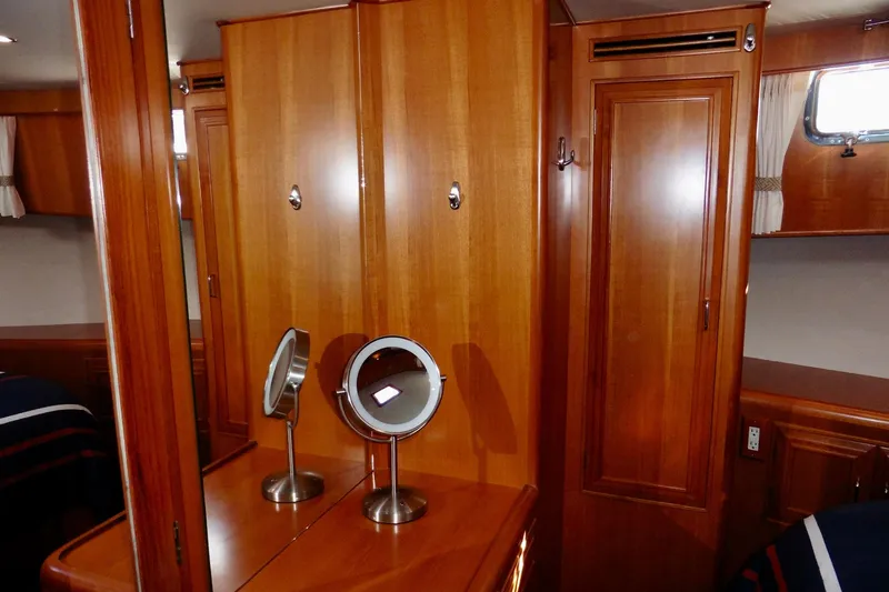Slide: The Image of Bathroom interior of 2000 Ocean Alexander 423 Classico yacht, featuring sink and toilet. - 71