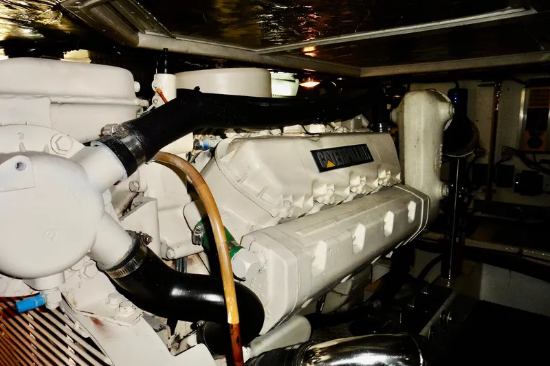 Slide: The Image of Engine room of 2000 Ocean Alexander 423 Classico yacht with Caterpillar engine. - 99