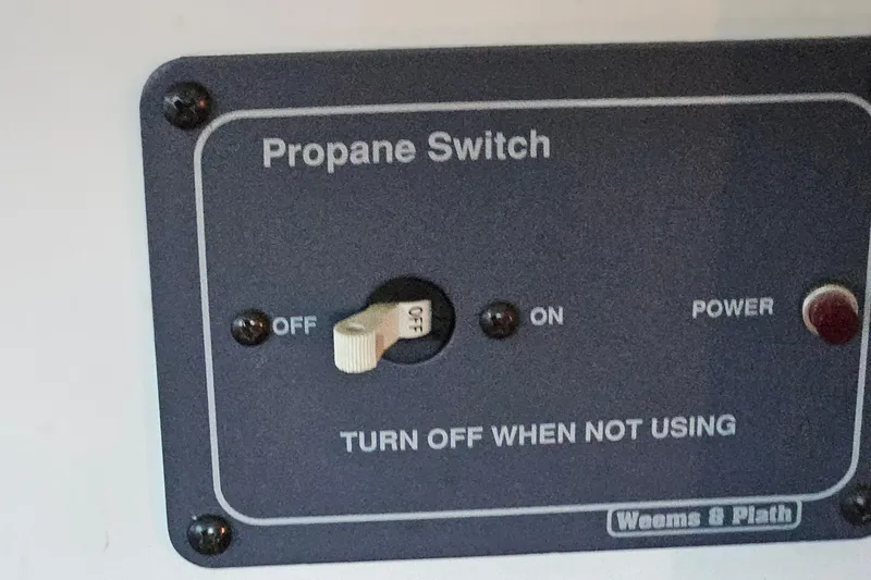 Slide: The Image of Propane switch panel on 1989 Breaux Brothers Sportfisherman boat, labeled "Turn Off When Not Using." - 15