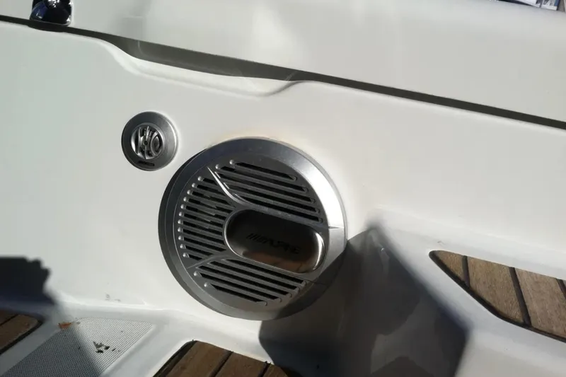 Slide: The Image of Speaker and control panel on 2011 Jeanneau 57 yacht deck. - 12