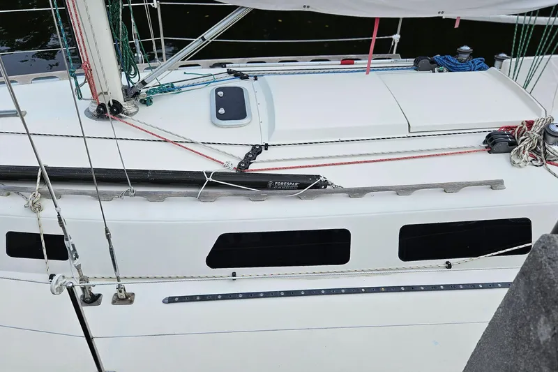 Slide: The Image of 1977 Peterson 34 Sloop sailboat deck with rigging and hatch details. - 3