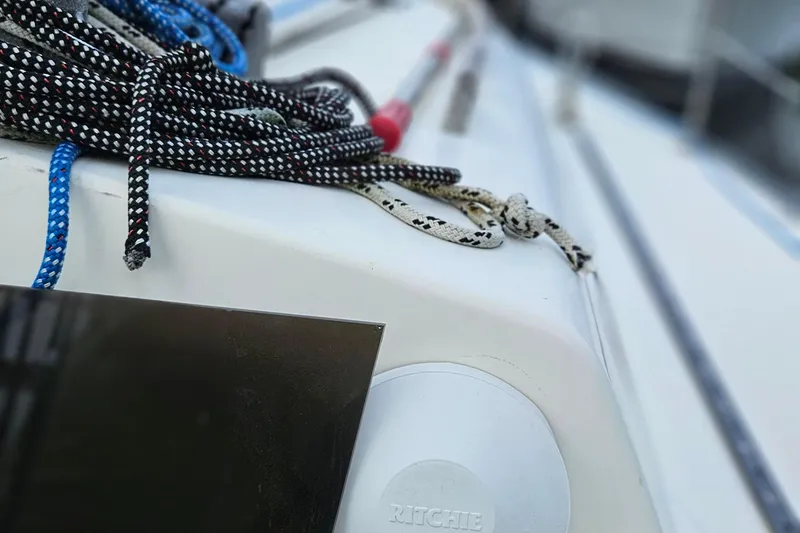 Slide: The Image of Close-up of ropes on a 1977 Peterson 34 Sloop sailboat deck. - 34