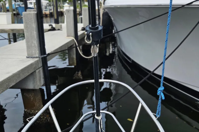 Slide: The Image of Bow of a 1977 Peterson 34 Sloop docked at a marina. - 6
