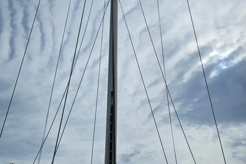 Slide: The Image of Mast and rigging of 1977 Peterson 34 Sloop against cloudy sky. - 9