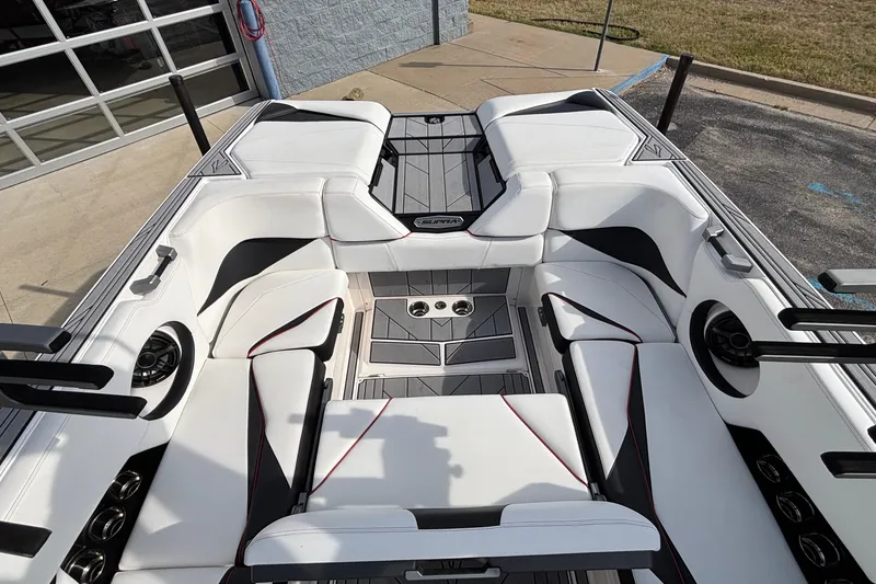 Slide: The Image of 2019 Supra SL 450 boat interior with white seating and modern design. - 17