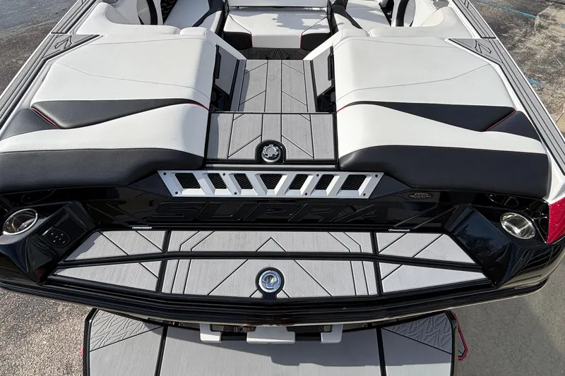 Slide: The Image of 2019 Supra SL 450 boat interior with sleek seating and modern design. - 20