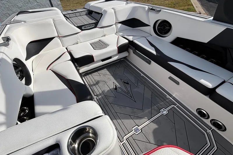 Slide: The Image of Luxurious interior of a 2019 Supra SL 450 boat with white seating and modern design. - 21