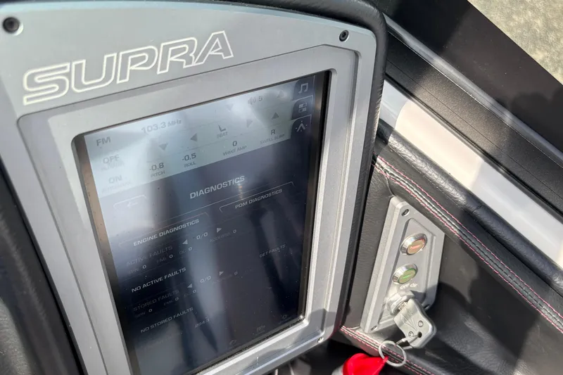 Slide: The Image of Touchscreen diagnostics panel in 2019 Supra SL 450 boat interior. - 30