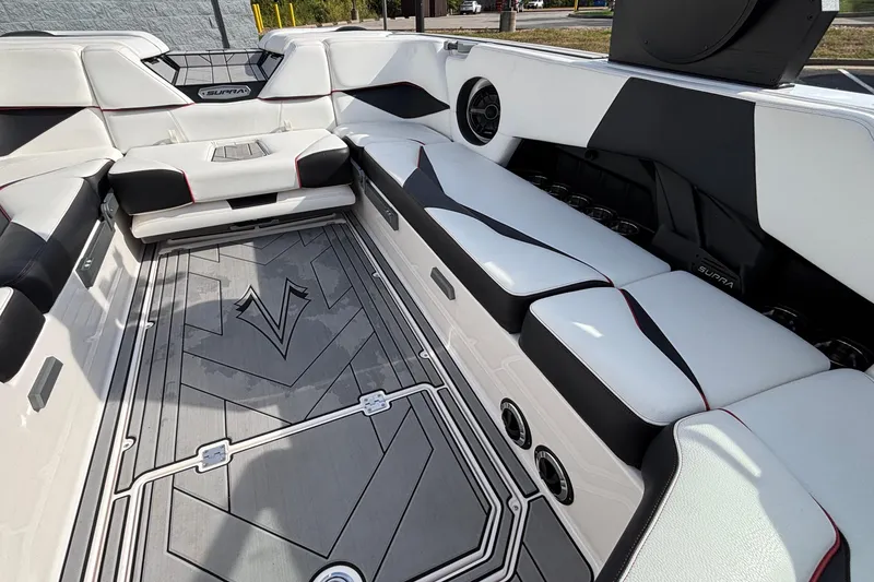 Slide: The Image of 2019 Supra SL 450 boat interior with sleek seating and modern design elements. - 34