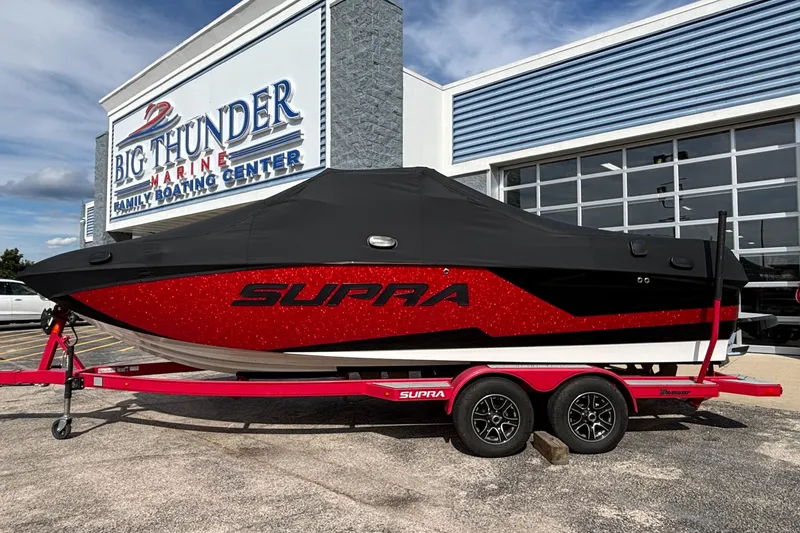 Slide: The Image of 2019 Supra SL 450 boat with cover at Big Thunder Marine dealership. - 8