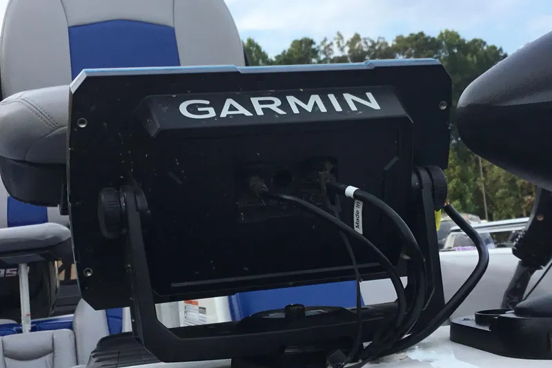 Slide: The Image of Garmin device on 2011 Skeeter SL190 boat, with blue and gray seating in the background. - 4