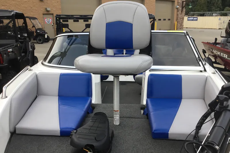 Slide: The Image of 2011 Skeeter SL190 boat interior with blue and gray seating. - 5