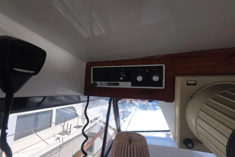 Slide: The Image of Interior view of a 1979 Trojan 44 Motor Yacht with radio equipment. - 18