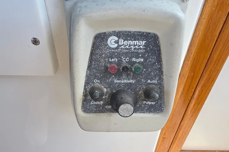 Slide: The Image of Control panel of a 1979 Trojan 44 Motor Yacht with Benmar autopilot system. - 43