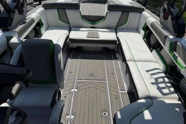 Slide: The Image of 2017 Nautique Super Air Nautique G23 interior with spacious seating and modern design. - 9